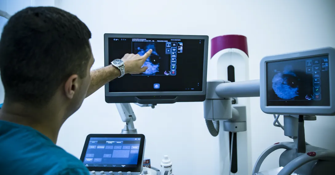 Doctor looking at mammogram