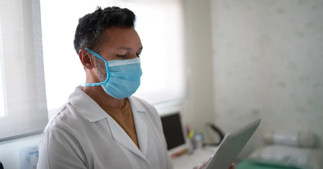 Doctor reading EHR Doctor reading EHR