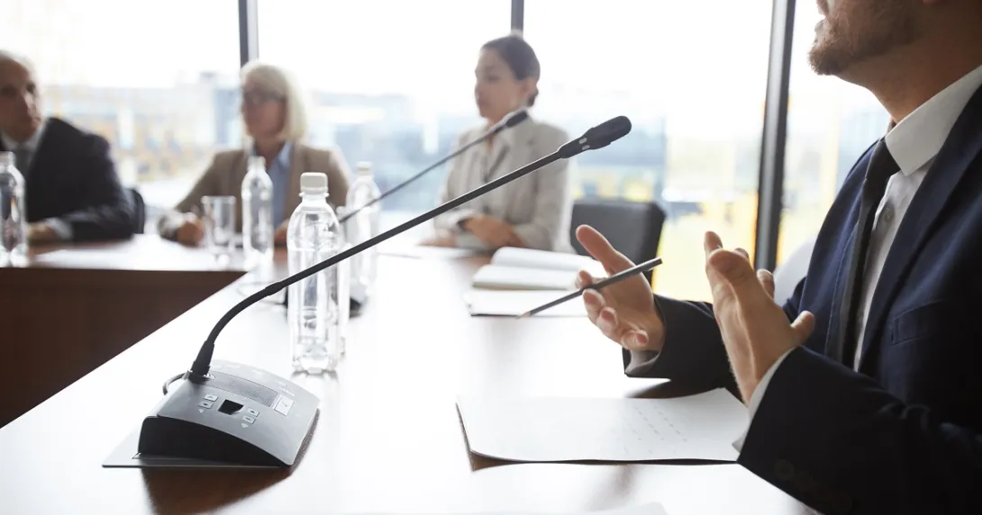 people discussing in a conference room