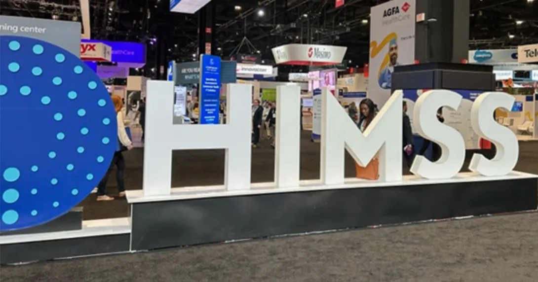HIMSS Global Health Conference and Exhibition sign and floor exhibits HIMSS Global Health Conference and Exhibition sign and floor exhibits