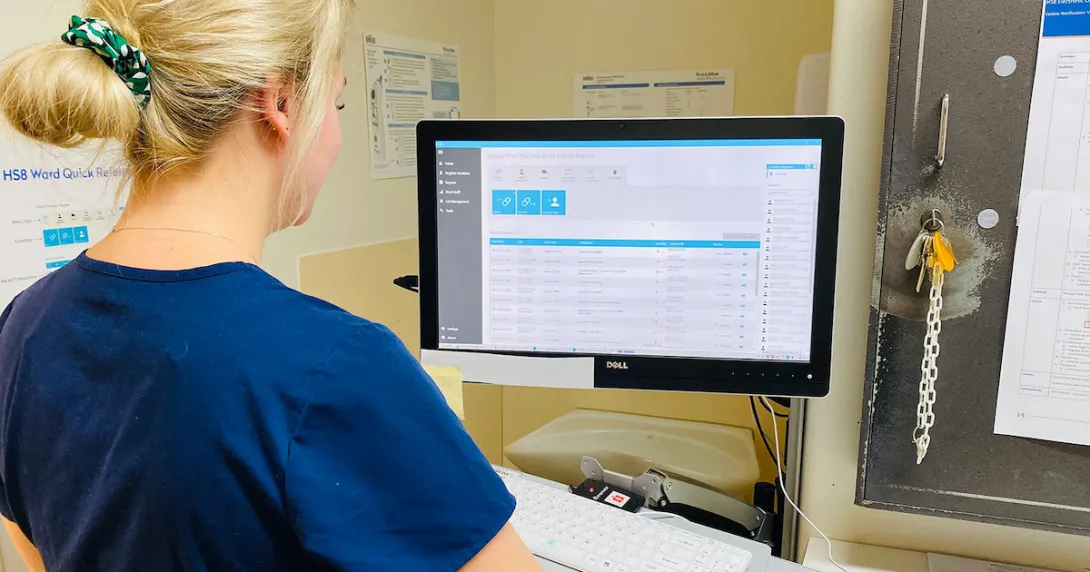 A nurse using Modeus' HS8 electronic medication register