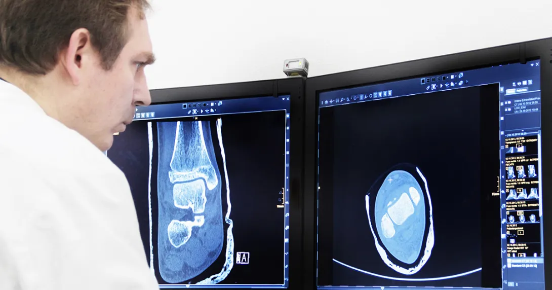 Radiologist examines X-ray Radiologist examines X-ray