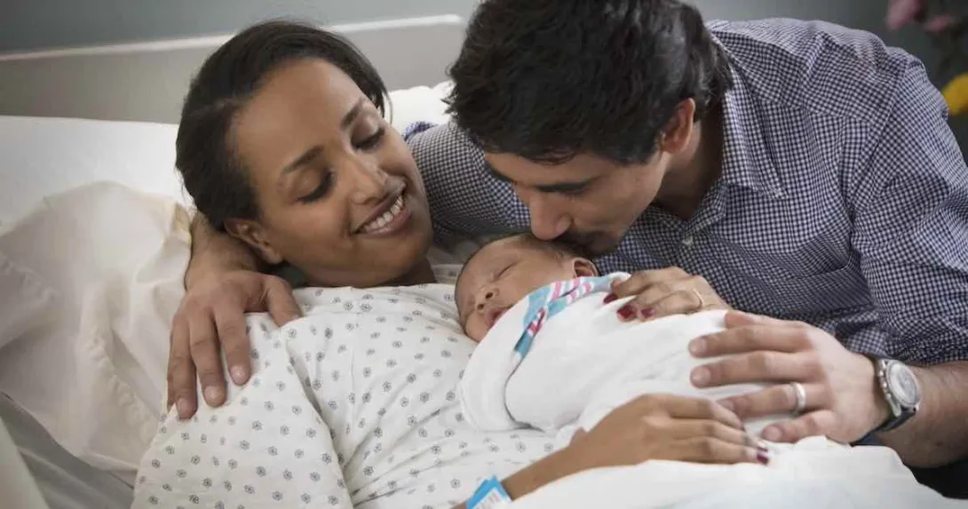 Parents with newborn baby