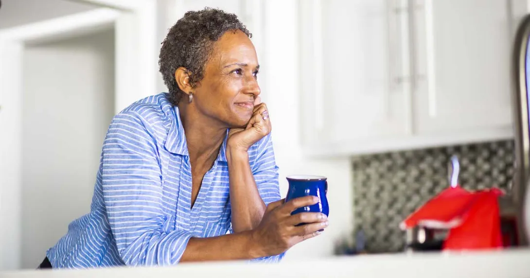 Person holding a mug