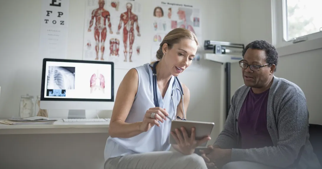 Doctor and patient review clinical notes Doctor and patient review clinical notes