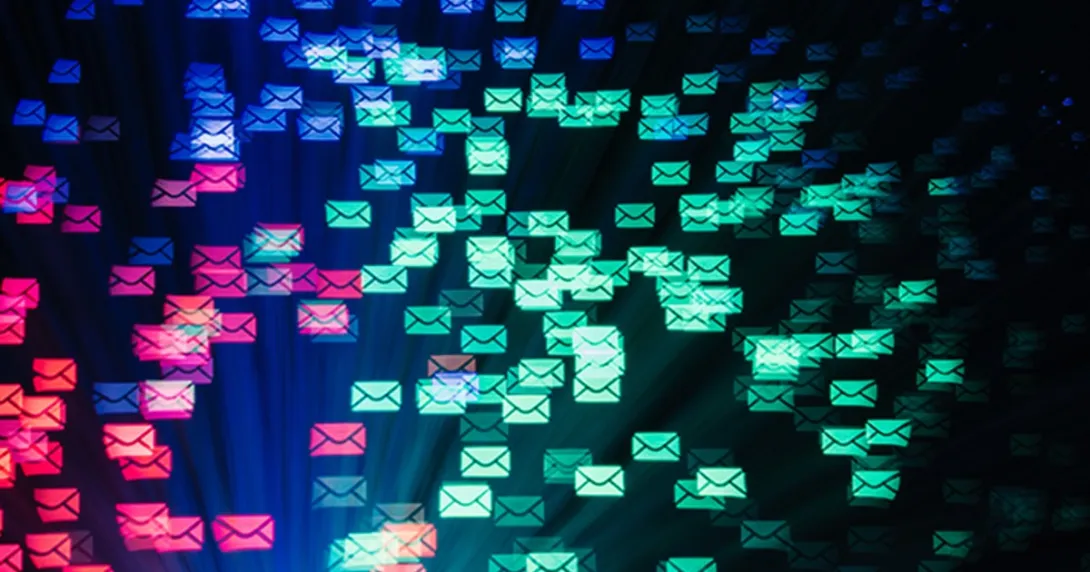 Email icons flying through a dark background