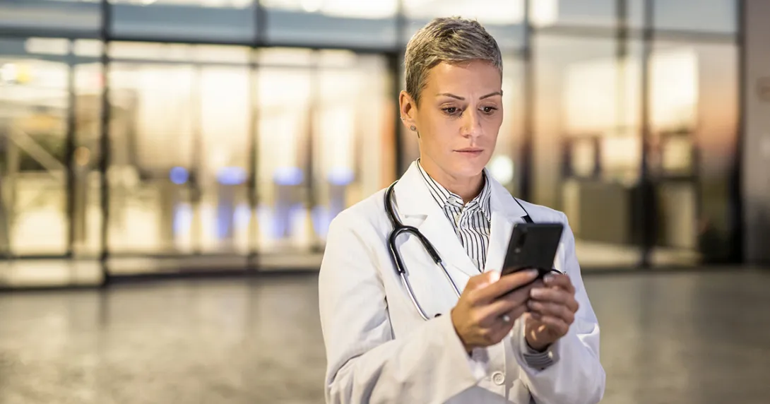 Healthcare worker using smartphone