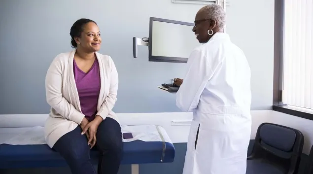Doctor talking to patient