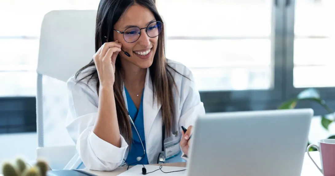 A clinician on a video call with a patient