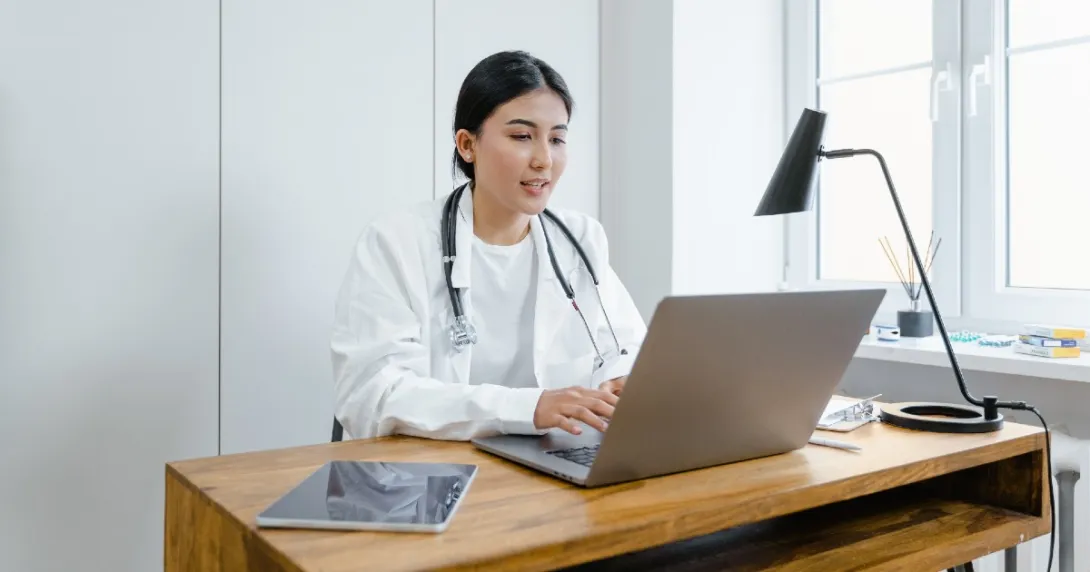 Clinician at a computer