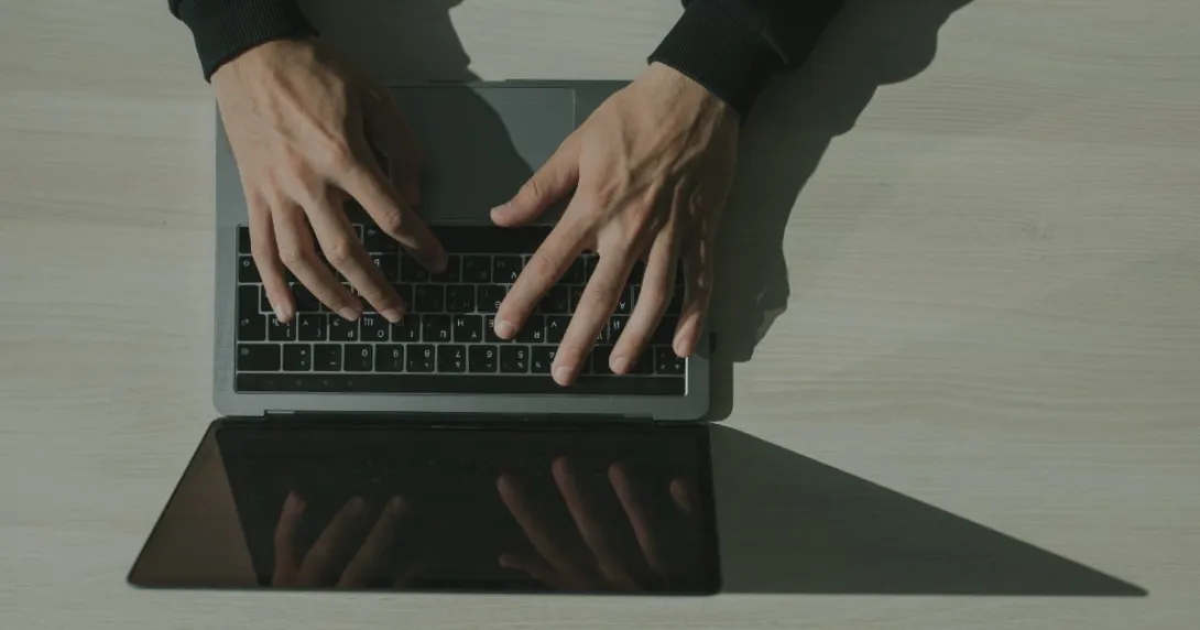 Hands at a keyboard