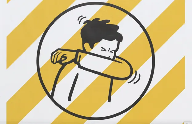 Cough or sneeze into your elbow Covid-19 poster by the NZ government.