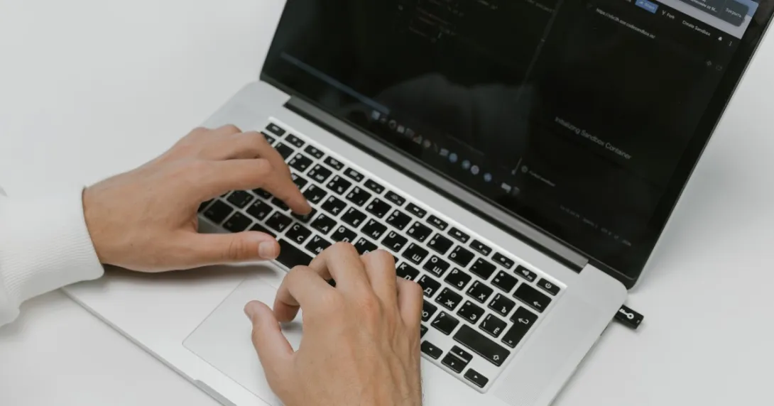 A person with a computer