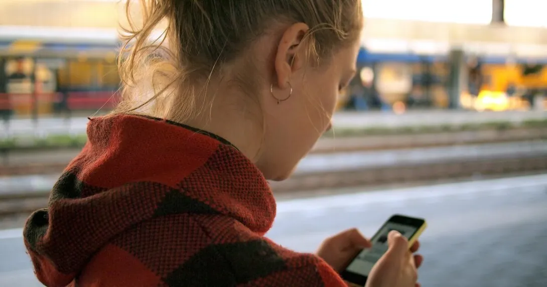 A person checking her smartphone