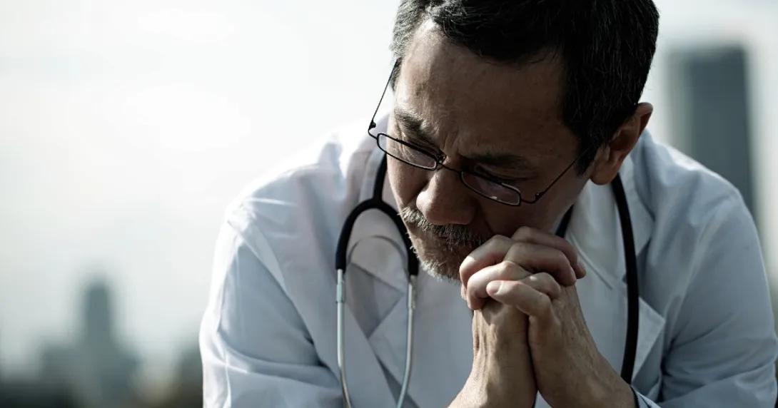 A doctor looking worried