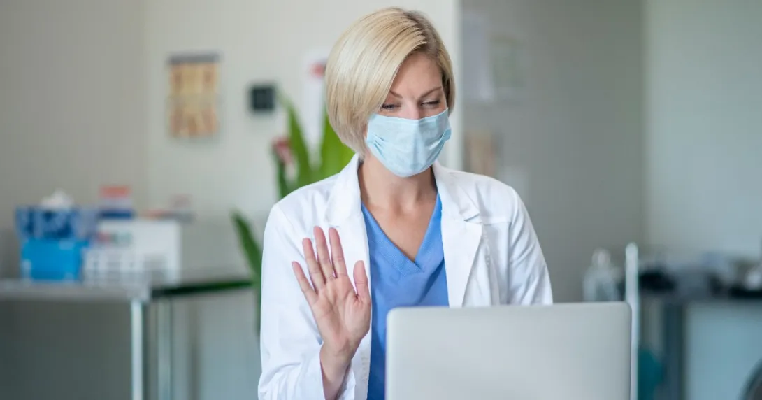 A doctor in front of a computer