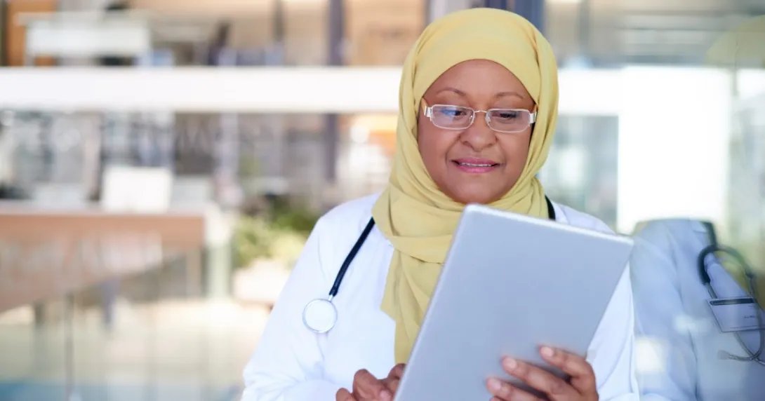 A doctor with a tablet