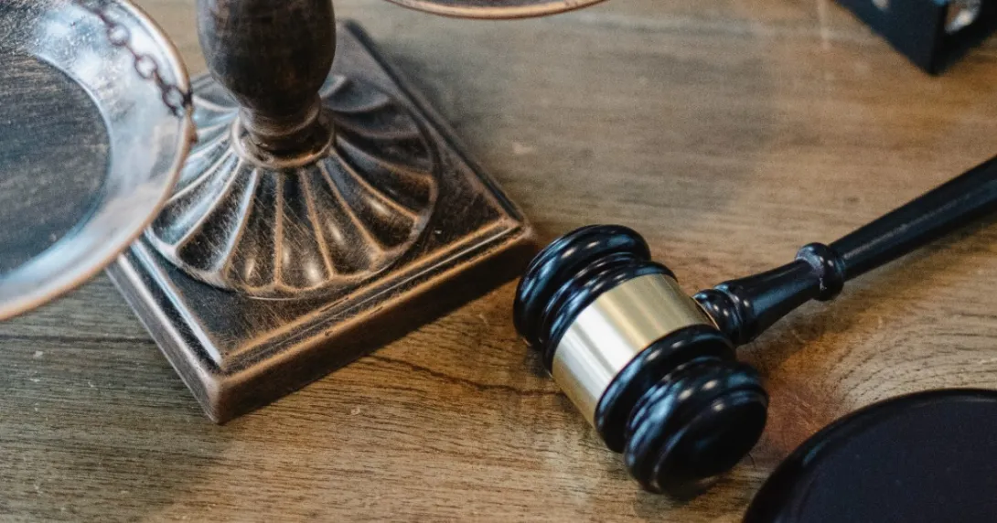 A gavel sitting on a desk