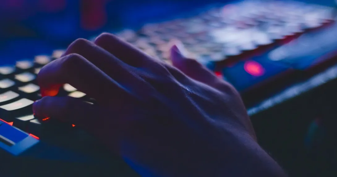A hand on a keyboard
