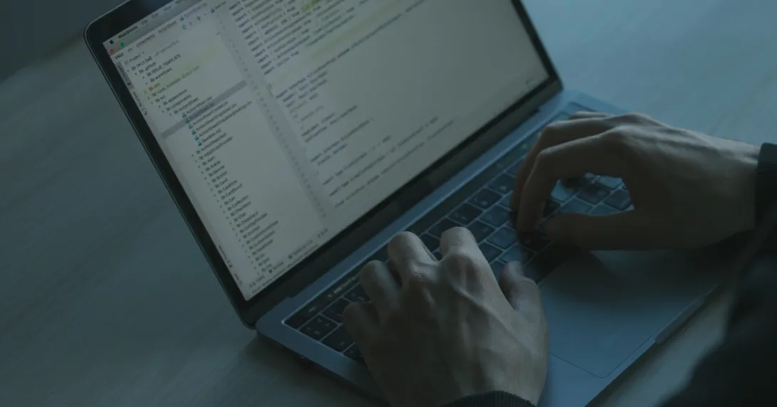 Hands at a computer