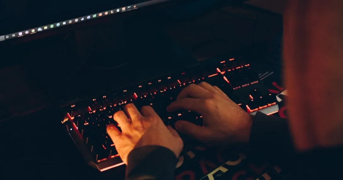hands typing on keyboard hands typing on keyboard