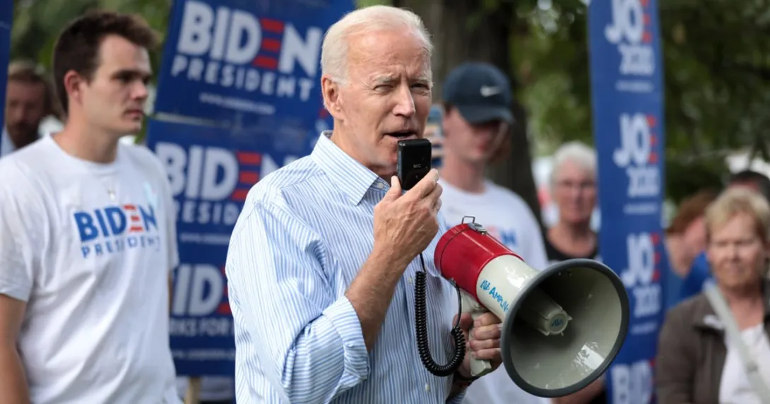 Joe Biden at a campaign rally with a megaphone