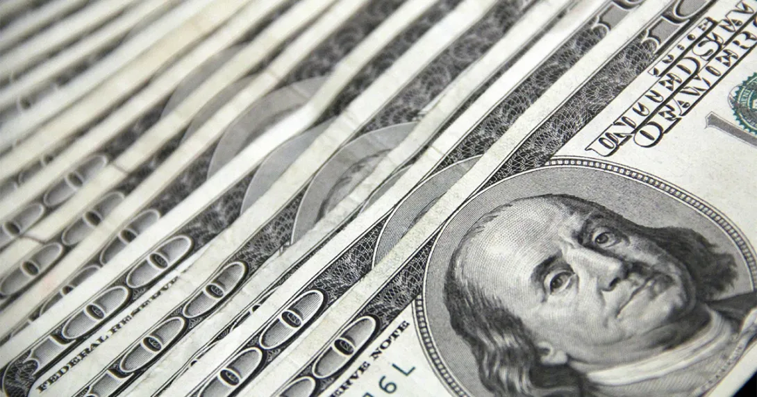 $100 bills laid out in fan succession $100 bills laid out in fan succession