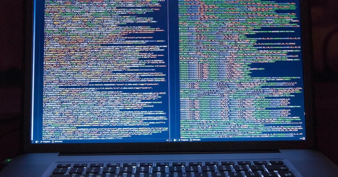 Code on two side-by-side vertical screens Code on two side-by-side vertical screens