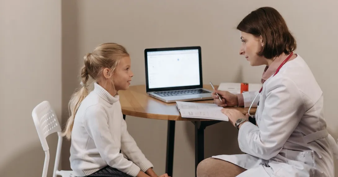 A young patient in consultation with a doctor