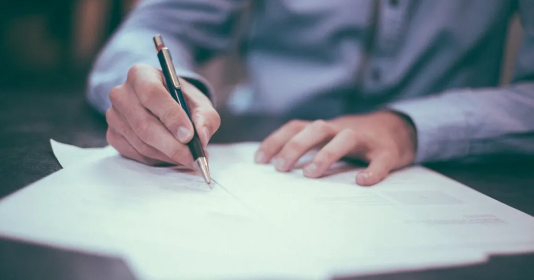 A person signing a document