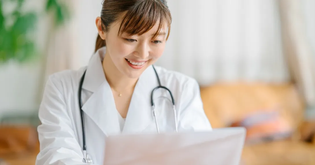 A doctor using telehealth