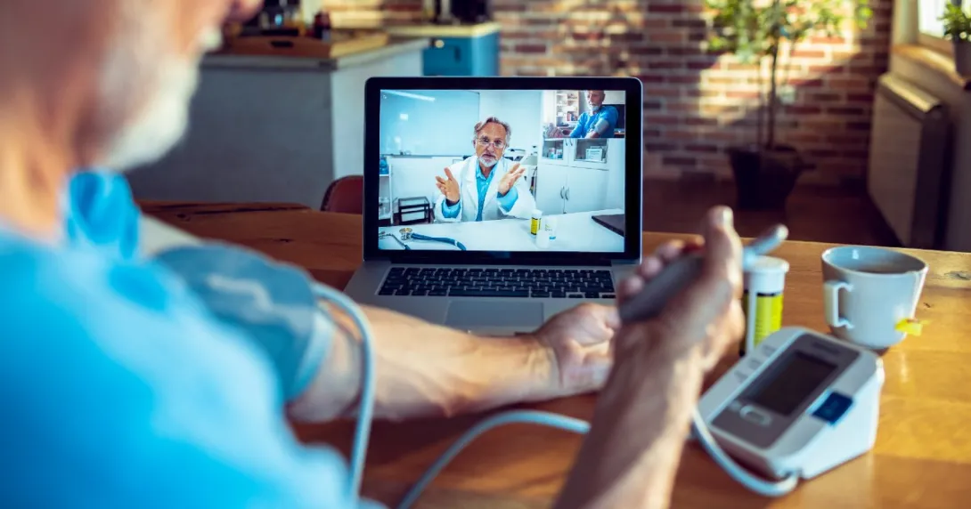 A patient communicating with health professional via videochat