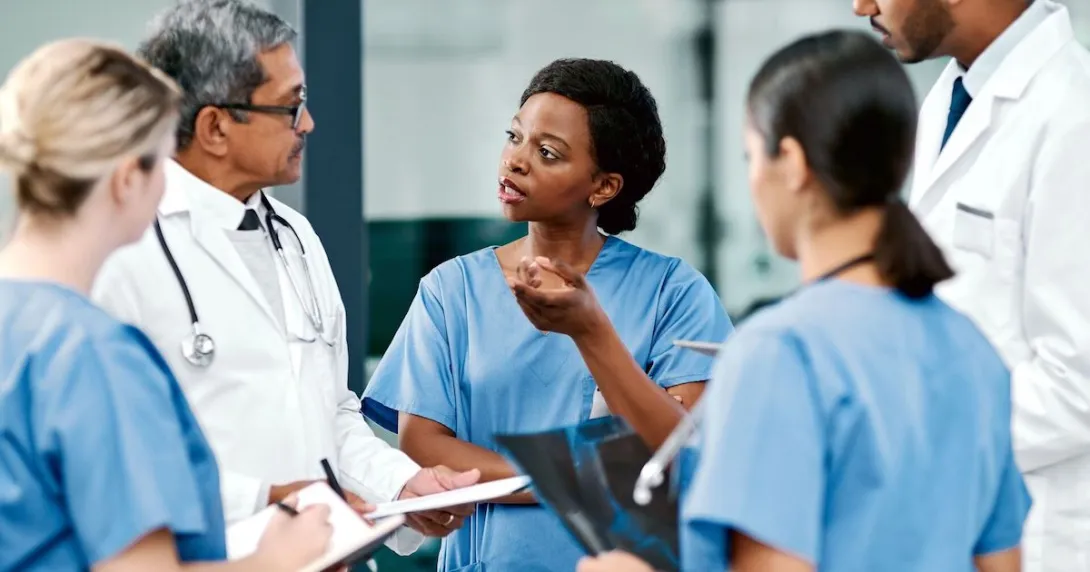 Medical staff having a discussion with each other Medical staff having a discussion with each other