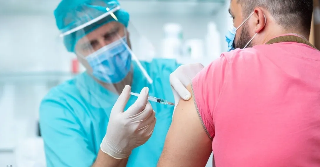 A vaccine shot being administered.