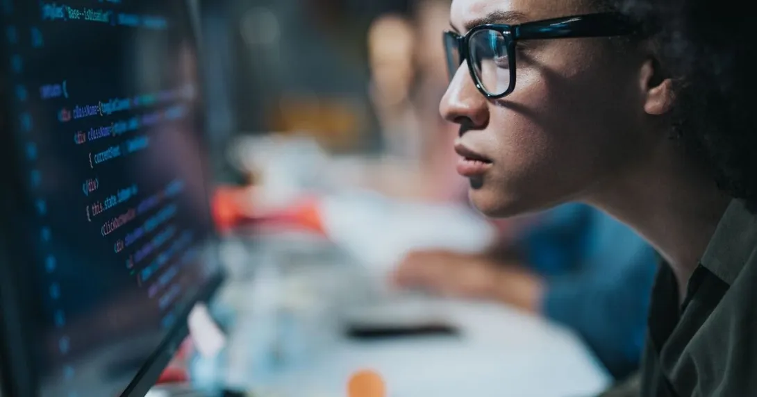 A computer programmer working on codes