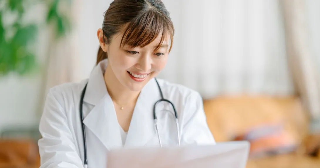 A doctor in a virtual consultation with a patient A doctor in a virtual consultation with a patient