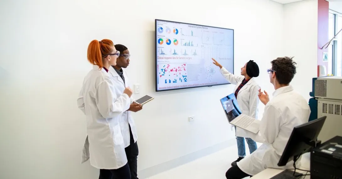 A team of medical scientists discussing among themselves