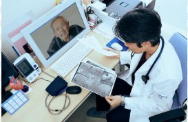 Doctor conducting telehealth appointment