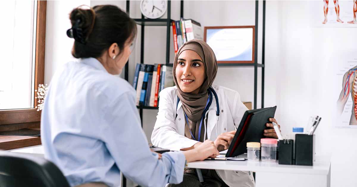 Patient talking to doctor