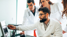 Clinicians at a computer