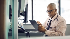 Doctor using a tablet
