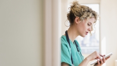 Nurse using a tablet