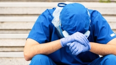 A burned-out clinician in PPE