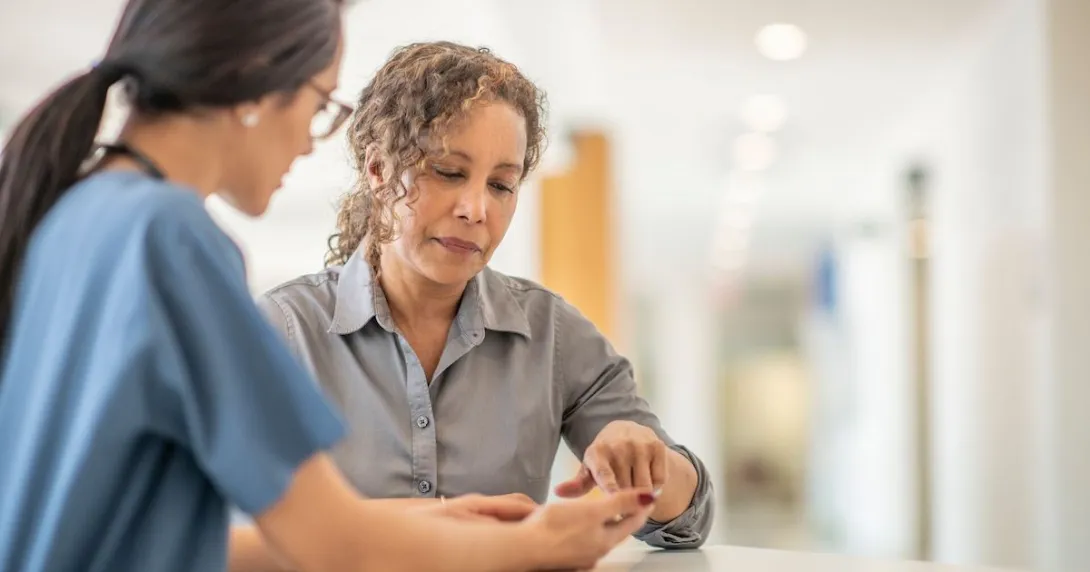 Doctor explains results to patient