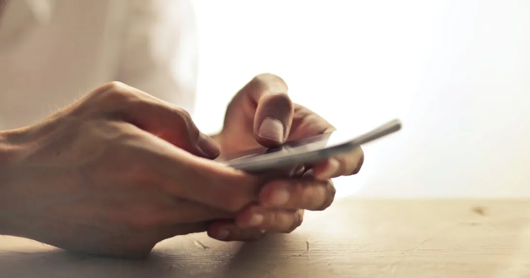A person texting A person texting