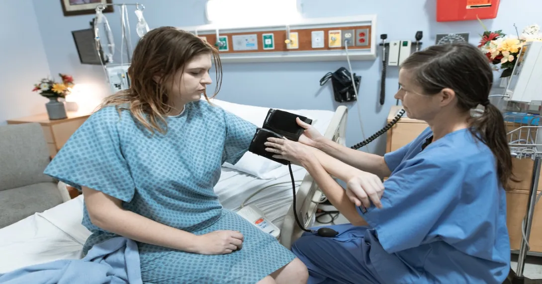 Blood pressure reading at hospital bedside